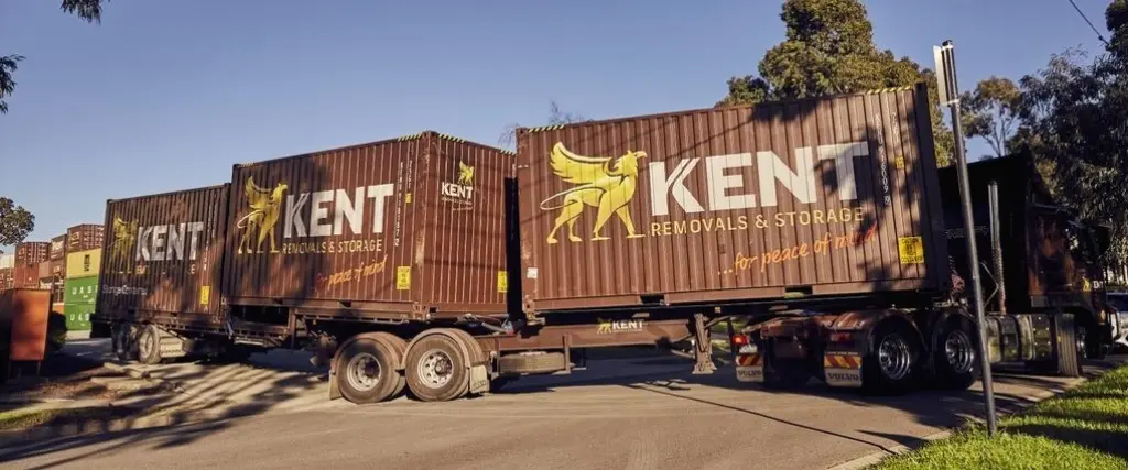 Large truck transporting Kent storage containers