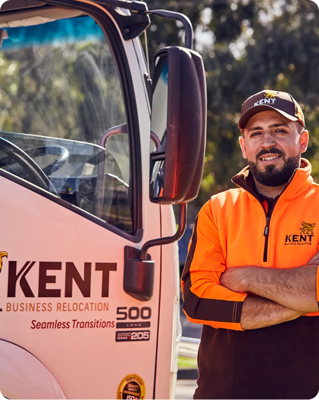 Kent Removals & Storage business relocation driver standing next to company moving truck