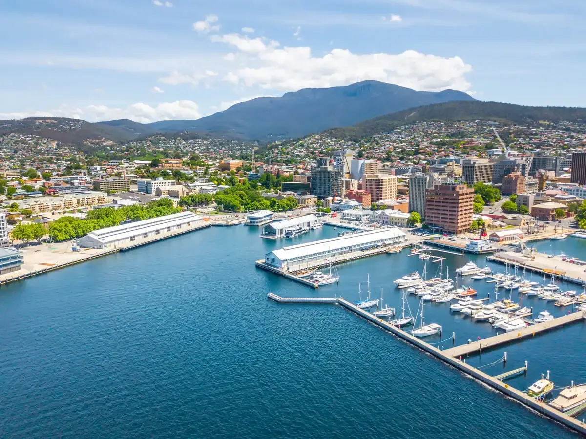 Aerial view of Hobart waterfront marina with Mount Wellington backdrop