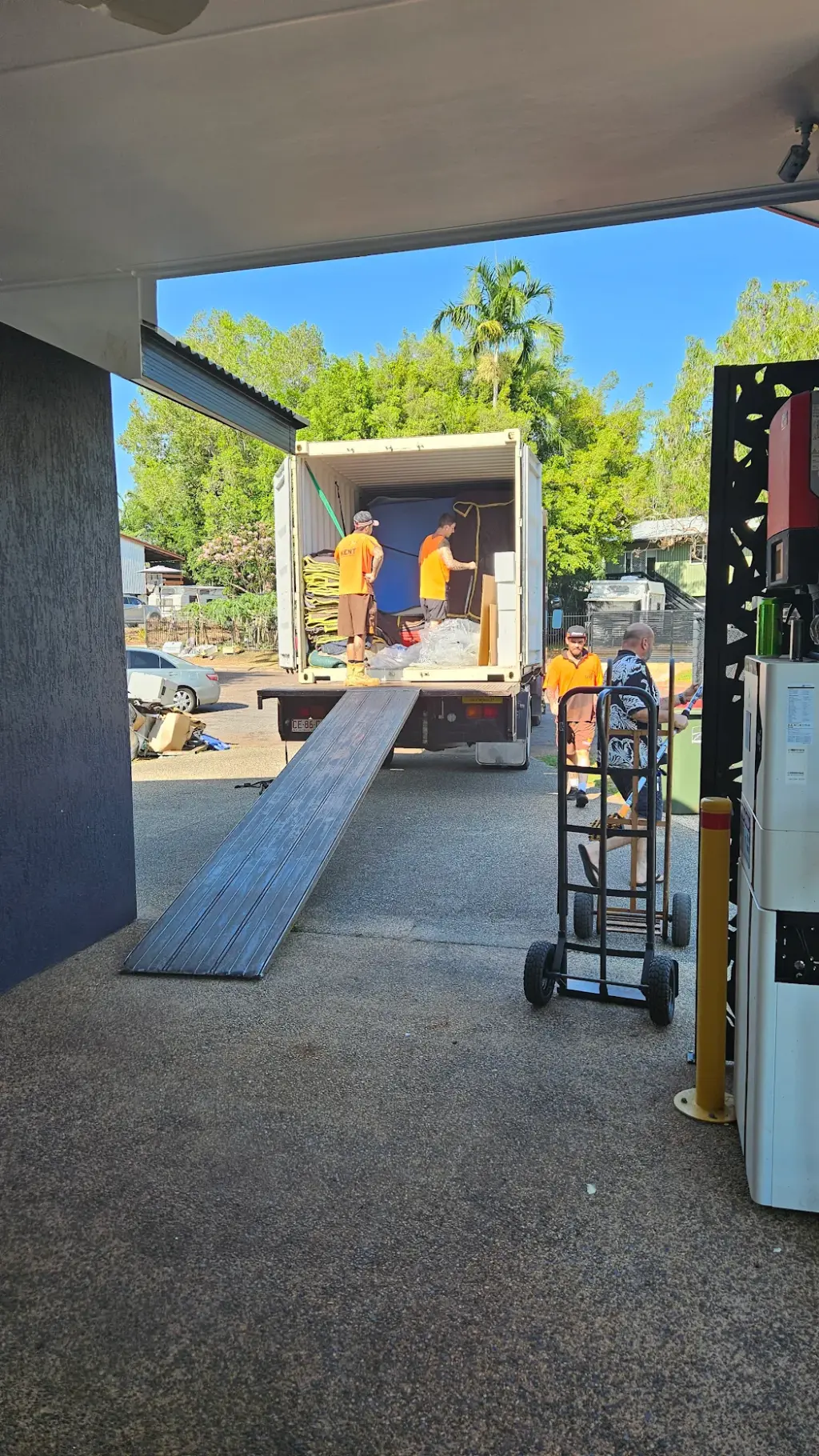 Kent Removals team loading furniture into storage container during moving service