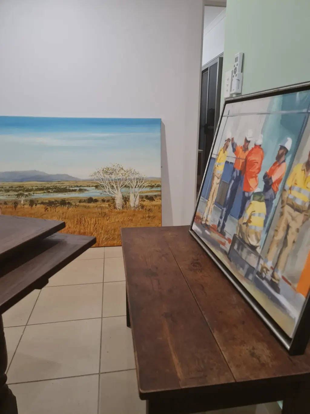 Framed artwork and furniture prepared for safe transport during home move
