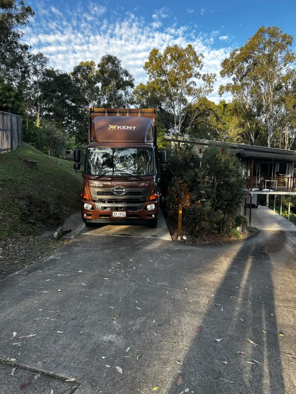 Kent Removals truck parked in residential driveway during home relocation