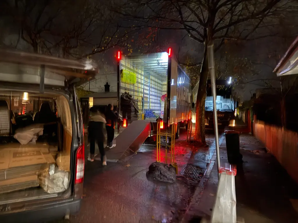 Kent Removals truck loading household items at night during residential move