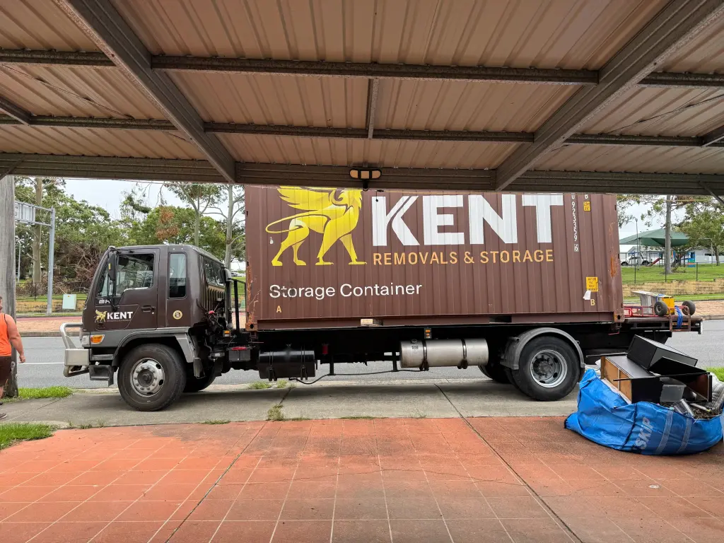 Kent Removals truck delivering storage container during residential moving service